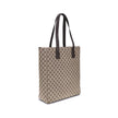 Brown Polyester HandbagGucci’s GG canvas Tote Bag is a timeless classic that combines practicality and iconic luxury. Made of the celebrated GG canvas, it is enhanced by elegant dark brown leather trim that outlines its structure. The distinctive green an