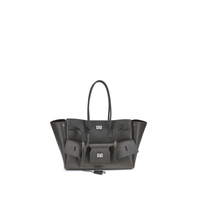 Black Calf Leather Bos Taurus Shoulder BagBalenciaga’s Bel Air medium Shoulder Bag is a spacious and functional accessory with a versatile pouch design. It features two handles for convenient carrying and the Balenciaga Paris logo embossed with silver lam