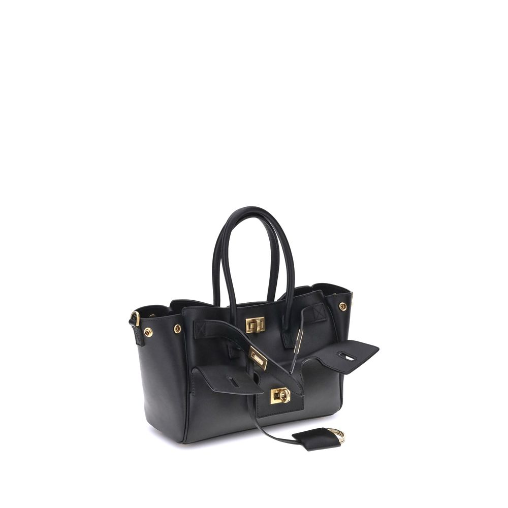 Black Calf Leather Bos Taurus Shoulder BagBalenciaga’s Bel Air mini Handbag is a versatile and iconic accessory. Carried on the shoulder, over the shoulder or by hand, it features two handles and an adjustable, removable shoulder strap. The embossed Balen