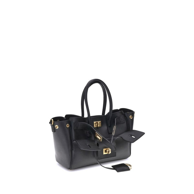 Black Calf Leather Bos Taurus Shoulder BagBalenciaga’s Bel Air mini Handbag is a versatile and iconic accessory. Carried on the shoulder, over the shoulder or by hand, it features two handles and an adjustable, removable shoulder strap. The embossed Balen