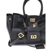 Black Calf Leather Bos Taurus Shoulder BagBalenciaga’s Bel Air mini Handbag is a versatile and iconic accessory. Carried on the shoulder, over the shoulder or by hand, it features two handles and an adjustable, removable shoulder strap. The embossed Balen