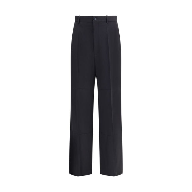 Black Viscose Dress PantsBalenciaga’s tailored Pants feature a zipper and button closure, two side welt pockets and two on the back. Belt loops at the waist complete the garment’s elegant and functional design. Season: AW25 Fit: Regular Composition: 54% V