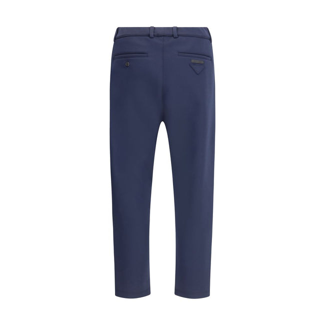 Blue Polyester Casual PantsPrada’s Jersey Pants combine comfort and style with an elasticized waistband and belt loops at the waist. They feature two side welt pockets and two on the back, enhanced by the triangular patch and iconic logo sewn on the back.