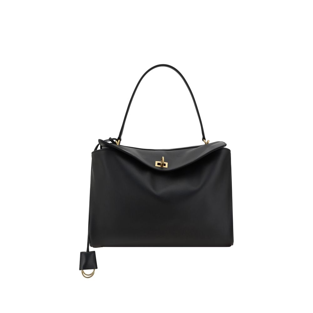 Black Calf Leather Bos Taurus Shoulder BagBalenciaga’s leather Rodeo Shoulder Bag features a top handle for a comfortable and stylish grip. The front closure features a flap and swivel, adding a distinctive and functional detail. Applied keychain detail o