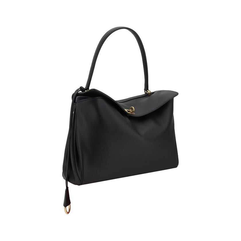 Black Calf Leather Bos Taurus Shoulder BagBalenciaga’s leather Rodeo Shoulder Bag features a top handle for a comfortable and stylish grip. The front closure features a flap and swivel, adding a distinctive and functional detail. Applied keychain detail o