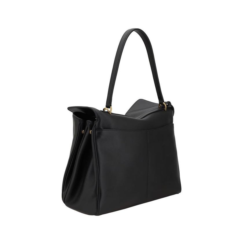 Black Calf Leather Bos Taurus Shoulder BagBalenciaga’s leather Rodeo Shoulder Bag features a top handle for a comfortable and stylish grip. The front closure features a flap and swivel, adding a distinctive and functional detail. Applied keychain detail o