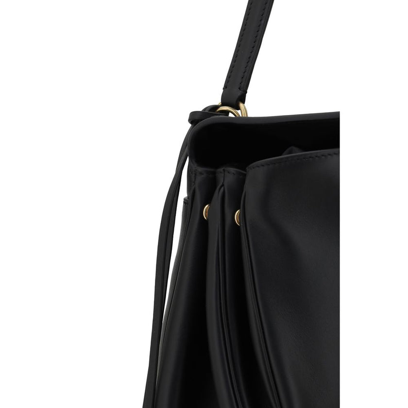 Black Calf Leather Bos Taurus Shoulder BagBalenciaga’s leather Rodeo Shoulder Bag features a top handle for a comfortable and stylish grip. The front closure features a flap and swivel, adding a distinctive and functional detail. Applied keychain detail o