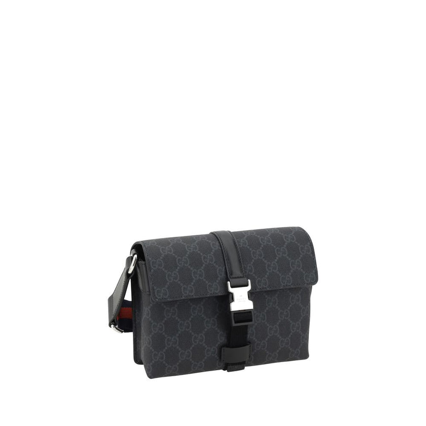 Black Polyethylene WalletGucci’s Mini GG Shoulder Bag features an adjustable webbing shoulder strap for comfort and versatility. The front closure features a flap with an applied buckle for a practical and elegant touch. The iconic GG Supreme pattern is r