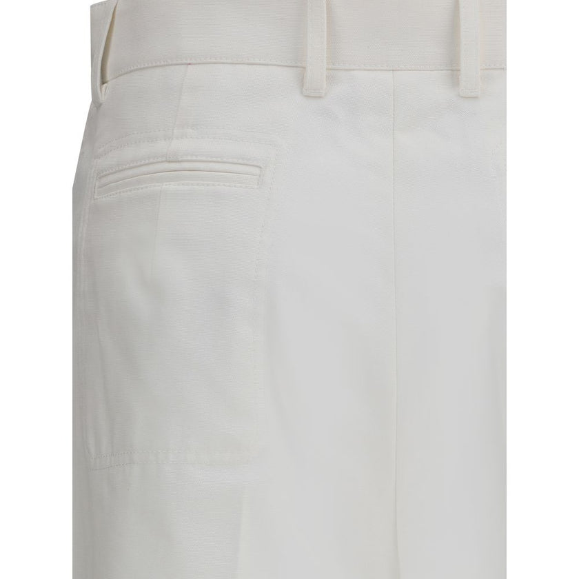 White Cotton Flared PantsChloé’s cotton Pants are a versatile piece with a casual style, perfect for any occasion. They feature a classic five-pocket flare pattern that combines functionality with an iconic, on-trend silhouette. The zip-and-button front c