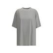 Gray Cotton T-ShirtCotton T-shirt by Balenciaga, featuring a vintage design with a worn effect. The model features a classic ribbed crew neck and an oversized fit that gives a relaxed, contemporary look. On the back, the iconic Balenciaga monogram in cont