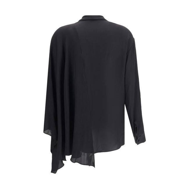Black Silk BlouseBalenciaga’s asymmetrical Blouse is made of lightweight and fluid pure silk georgette. The sophisticated design is enriched with elegant ribbons to tie at the neck, a batwing sleeve and a long sleeve with a button-adjustable cuff. The fro