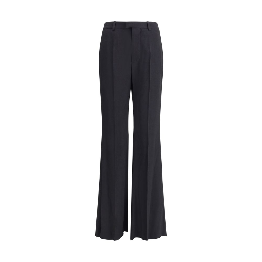 Black Viscose Flared PantsBalenciaga’s flare Pants have a sleek and contemporary cut. The model features a zipper and button closure, belt loops at the waist and two side slash pockets. The flared silhouette enhances the figure, making the garment ideal f