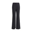 Black Viscose Flared PantsBalenciaga’s flare Pants have a sleek and contemporary cut. The model features a zipper and button closure, belt loops at the waist and two side slash pockets. The flared silhouette enhances the figure, making the garment ideal f
