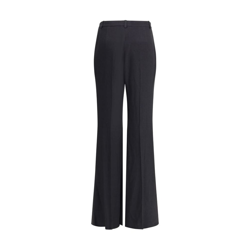 Black Viscose Flared PantsBalenciaga’s flare Pants have a sleek and contemporary cut. The model features a zipper and button closure, belt loops at the waist and two side slash pockets. The flared silhouette enhances the figure, making the garment ideal f