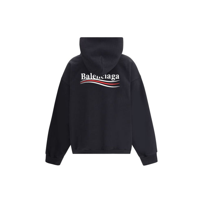 Black Cotton SweatshirtCotton Hoodie by Balenciaga features an oversized cut with a bold character. The design features a double-slider front zipper, two patch welt pockets on the front, and ribbed cuffs and hem for a structured fit. The iconic contrastin
