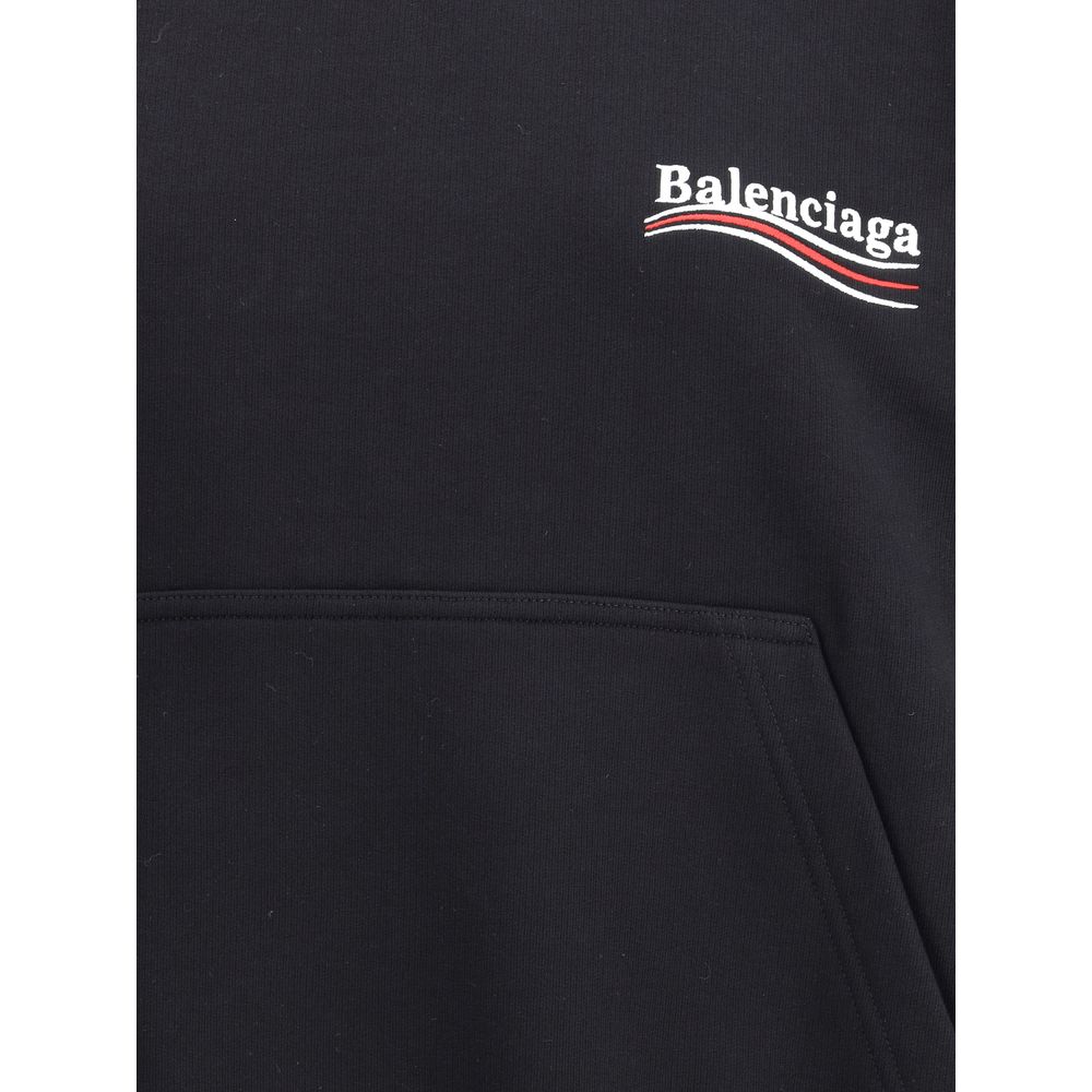 Black Cotton SweatshirtCotton Hoodie by Balenciaga features an oversized cut with a bold character. The design features a double-slider front zipper, two patch welt pockets on the front, and ribbed cuffs and hem for a structured fit. The iconic contrastin