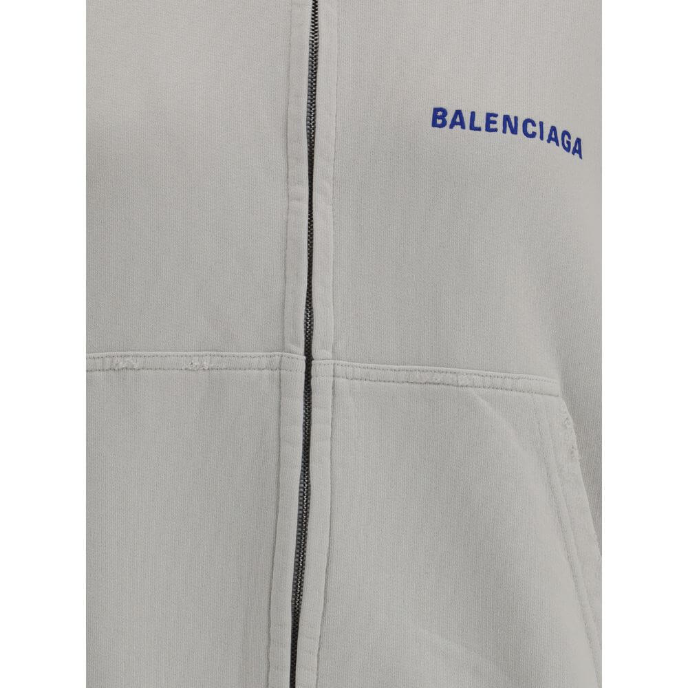 Gray Cotton SweatshirtCotton Hoodie by Balenciaga features a vintage worn-in design. Featuring a double-slider front zipper, it has two patch welt pockets on the front for a practical and functional style. Ribbed cuffs and hem ensure a comfortable, struct