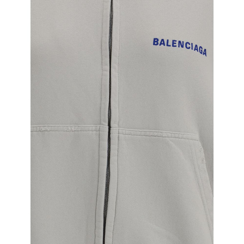 Gray Cotton SweatshirtCotton Hoodie by Balenciaga features a vintage worn-in design. Featuring a double-slider front zipper, it has two patch welt pockets on the front for a practical and functional style. Ribbed cuffs and hem ensure a comfortable, struct