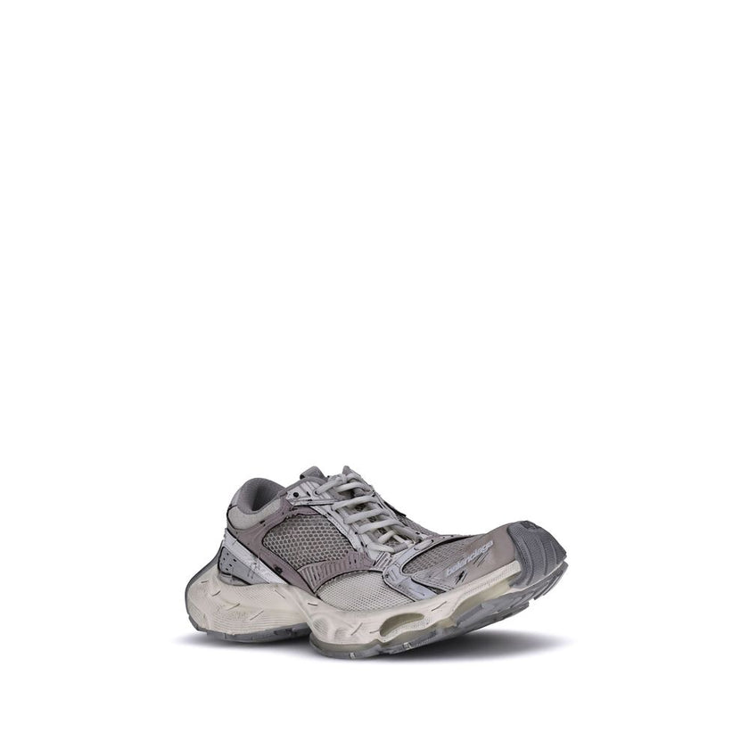 Gray Polyethylene Athletic SneakersBalenciaga’s Stapler Sneakers embody the brand’s unconventional and experimental spirit, combining deconstructed aesthetics and avant-garde details. The worn-effect design gives the shoe an intentionally worn-in look, wh