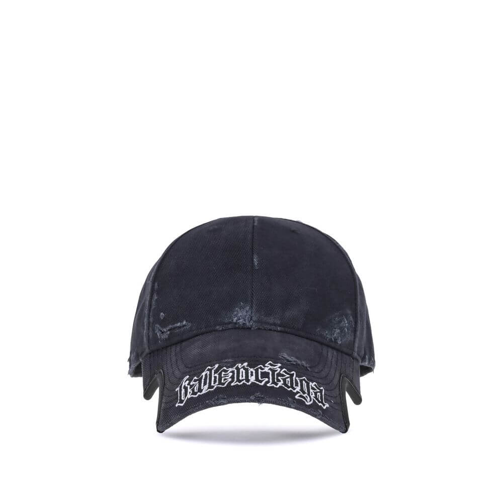 Black Cotton Cap (Baseball Hat)Balenciaga’s Blackletter Script Baseball Hat combines bold style with functional details. Featuring embroidered ventilation eyelets on the top, it has a cut-out visor on both sides and an adjustable pull tab with hook-and-lo