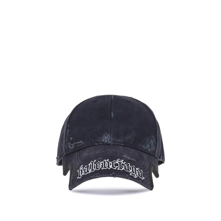 Black Cotton Cap (Baseball Hat)Balenciaga’s Blackletter Script Baseball Hat combines bold style with functional details. Featuring embroidered ventilation eyelets on the top, it has a cut-out visor on both sides and an adjustable pull tab with hook-and-lo