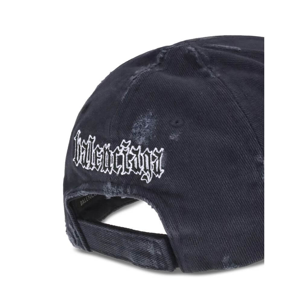 Black Cotton Cap (Baseball Hat)Balenciaga’s Blackletter Script Baseball Hat combines bold style with functional details. Featuring embroidered ventilation eyelets on the top, it has a cut-out visor on both sides and an adjustable pull tab with hook-and-lo