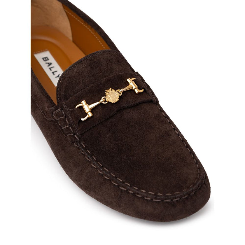 Brown Leather MoccassinBally Brown Suede Loafers with Gold Logo. In brown suede, rounded toe, insole with logo, gold metallic logo applied on the band. Segmented rubber outsole. Size 8-9-10-10.5EU – 41-42.5-44-44.5IT Composition: 100% Leather Internal SKU