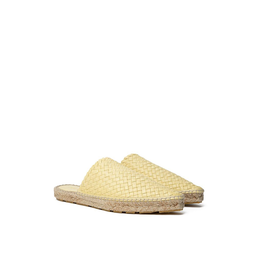 Yellow Leather EspadrilleLagoon Espadrilles in Yellow with Intreccio Bottega Veneta. Pointed toe, open back, light yellow upper with iconic intrecciato motif, woven rope sole, rubber details on the outside. Composition: 100% Leather Internal SKU: 25MG27 B
