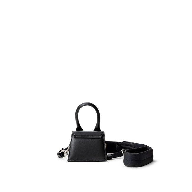 Black Leather HandbagJacquemus Black Leather Mini Le Chiquito Bag. In black leather, front opening with hidden snap button, single compartment. Silver metal logo on the side. Composition: 100% Leather Internal SKU: 25MG114 Brand SKU: 216BA0013061990Black