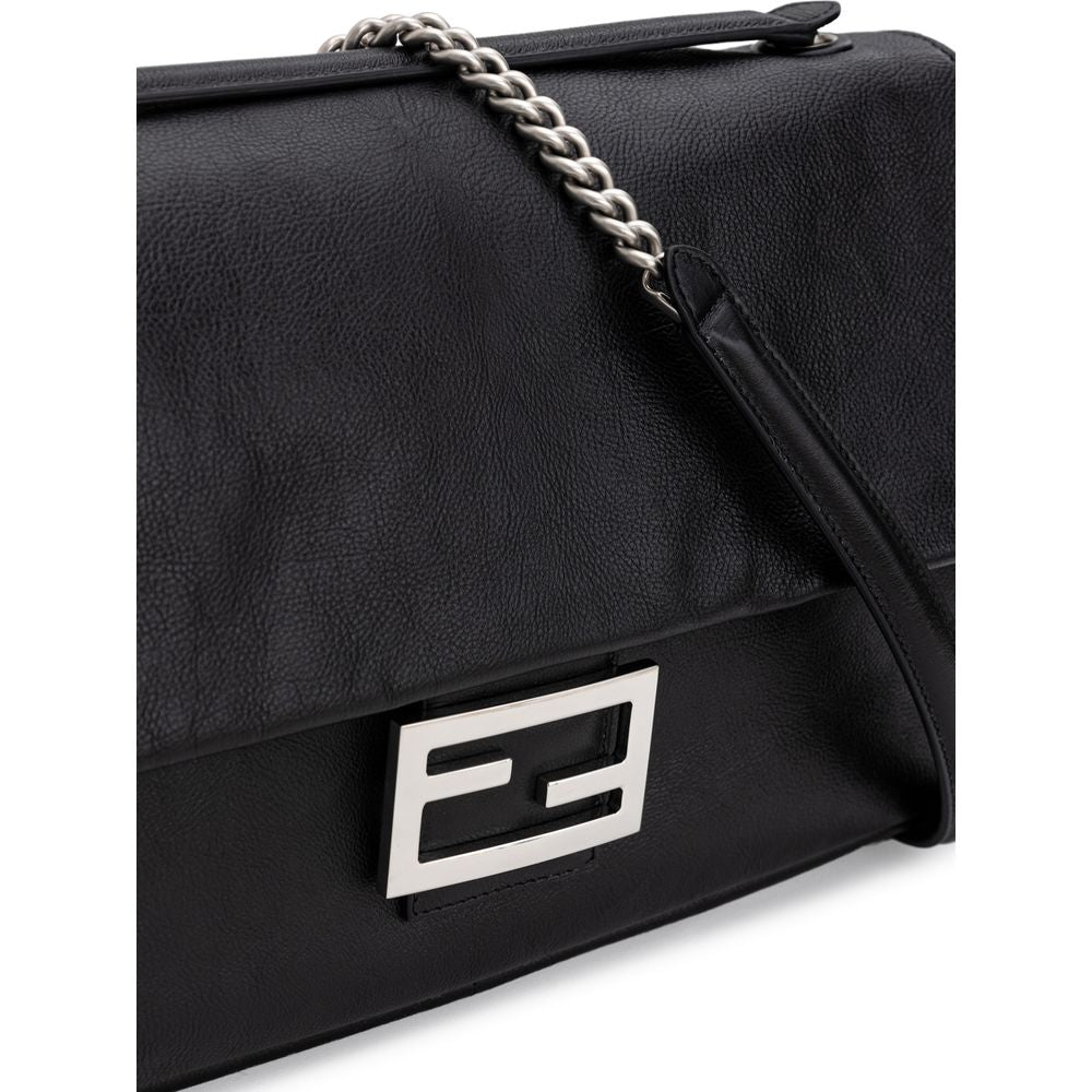 Black Leather Shoulder BagFendi Shoulder Baguette Bag. Black leather, front covered snap button closure, metal logo buckle, chain with satin aged effect, single interior compartment with zipper pocket, soft leather. Composition: 100% Leather Inner SKU: 25