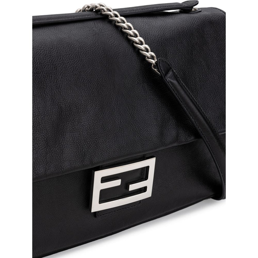 Black Leather Shoulder BagFendi Shoulder Baguette Bag. Black leather, front covered snap button closure, metal logo buckle, chain with satin aged effect, single interior compartment with zipper pocket, soft leather. Composition: 100% Leather Inner SKU: 25