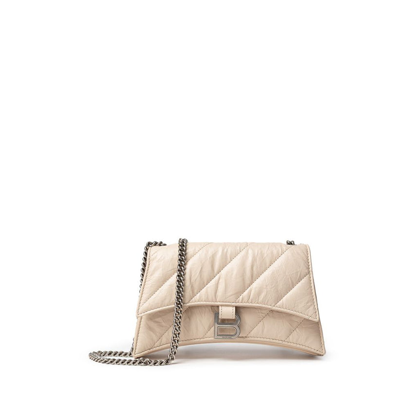 Beige Leather Shoulder BagBalenciaga Small Crush Bag in Beige with Chain. In quilted leather with a wrinkled effect, front closure with covered snap button and metal BB logo. Internal compartment and zip pocket, compartments and metal chain. Composition: