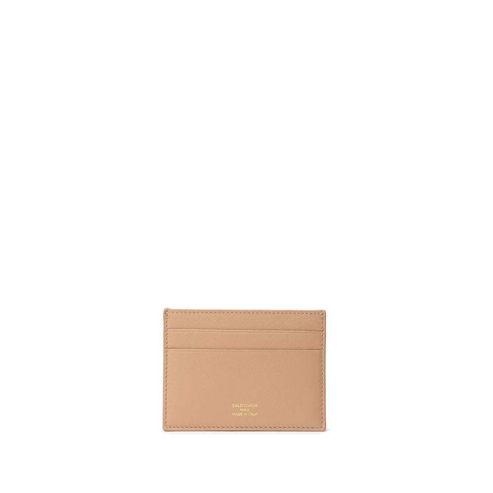 Beige Leather CardholderBalenciaga Dark Beige Leather Card Holder. Contrasting gold logo on the front, brushed leather with four compartments Composition: 100% Leather Internal SKU: 25MG109 Brand SKU: 7432162AAFT9607Beige Leather Cardholder${tagsBalenciag