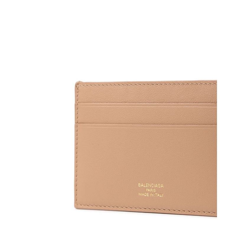Beige Leather CardholderBalenciaga Dark Beige Leather Card Holder. Contrasting gold logo on the front, brushed leather with four compartments Composition: 100% Leather Internal SKU: 25MG109 Brand SKU: 7432162AAFT9607Beige Leather Cardholder${tagsBalenciag