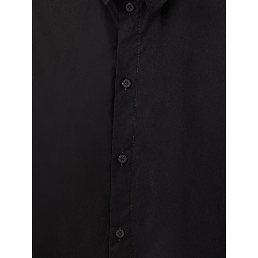 Black Cotton Long DressBalenciaga Suspended Effect Shirt Dress. In black cotton poplin, shirt effect suspended from the collar, open back. The dress can be worn two ways. Size FR36/IT40 Composition: 100% Cotton Inner SKU: 25MAR50 Brand SKU: 809049TNM60Bla