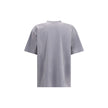 Gray Cotton T-ShirtBalenciaga’s cotton T-Shirt features a classic ribbed crew neck and the iconic BB logo embroidered on the front, adding a distinctive touch of luxury. The vintage worn-effect design gives the T-shirt a unique look, as if it has already