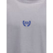 Gray Cotton T-ShirtBalenciaga’s cotton T-Shirt features a classic ribbed crew neck and the iconic BB logo embroidered on the front, adding a distinctive touch of luxury. The vintage worn-effect design gives the T-shirt a unique look, as if it has already