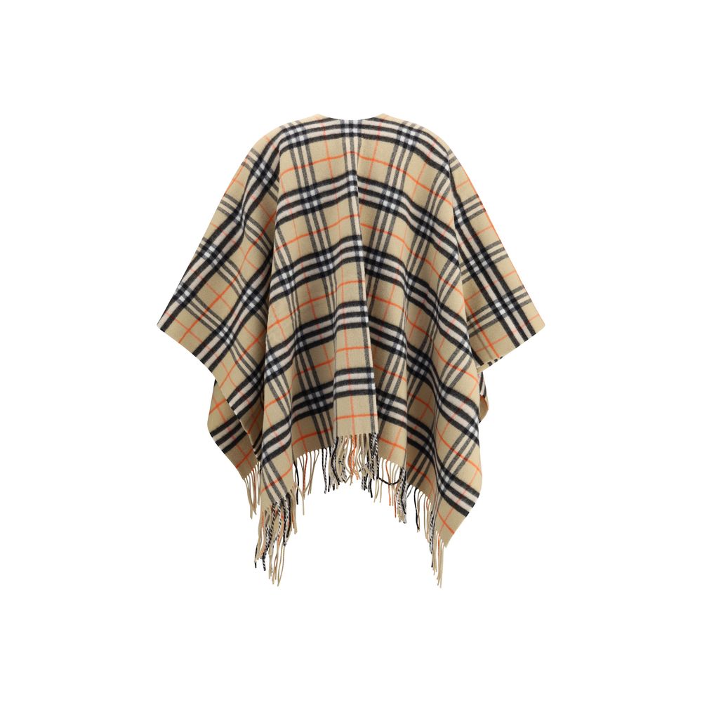 Multicolor Wool CoatThe Burberry Wool Cashmere Cape is crafted from lightweight fabrics woven with the iconic Burberry Check in a historic Scottish weaving mill with over 200 years of experience. The fabric is washed with local spring water and double-was