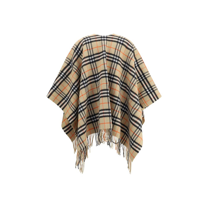 Multicolor Wool CoatThe Burberry Wool Cashmere Cape is crafted from lightweight fabrics woven with the iconic Burberry Check in a historic Scottish weaving mill with over 200 years of experience. The fabric is washed with local spring water and double-was