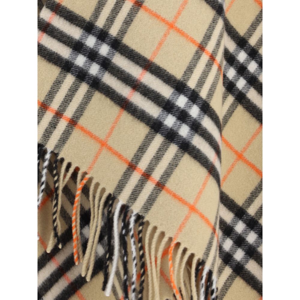 Multicolor Wool CoatThe Burberry Wool Cashmere Cape is crafted from lightweight fabrics woven with the iconic Burberry Check in a historic Scottish weaving mill with over 200 years of experience. The fabric is washed with local spring water and double-was