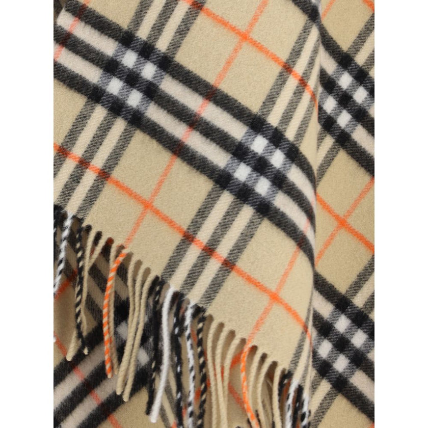 Multicolor Wool CoatThe Burberry Wool Cashmere Cape is crafted from lightweight fabrics woven with the iconic Burberry Check in a historic Scottish weaving mill with over 200 years of experience. The fabric is washed with local spring water and double-was