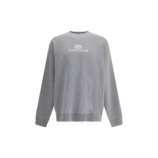 Gray Cotton SweatshirtCotton Sweater by Balenciaga features a ribbed crew neck that ensures comfort and style. The garment features the iconic contrasting monogram on the front, a distinctive element that enhances the design. Ribbed cuffs and hem complete