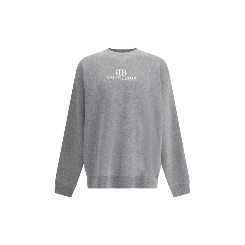 Gray Cotton SweatshirtCotton Sweater by Balenciaga features a ribbed crew neck that ensures comfort and style. The garment features the iconic contrasting monogram on the front, a distinctive element that enhances the design. Ribbed cuffs and hem complete