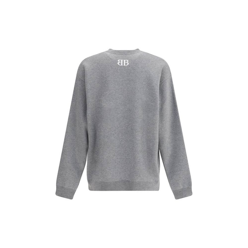 Gray Cotton SweatshirtCotton Sweater by Balenciaga features a ribbed crew neck that ensures comfort and style. The garment features the iconic contrasting monogram on the front, a distinctive element that enhances the design. Ribbed cuffs and hem complete