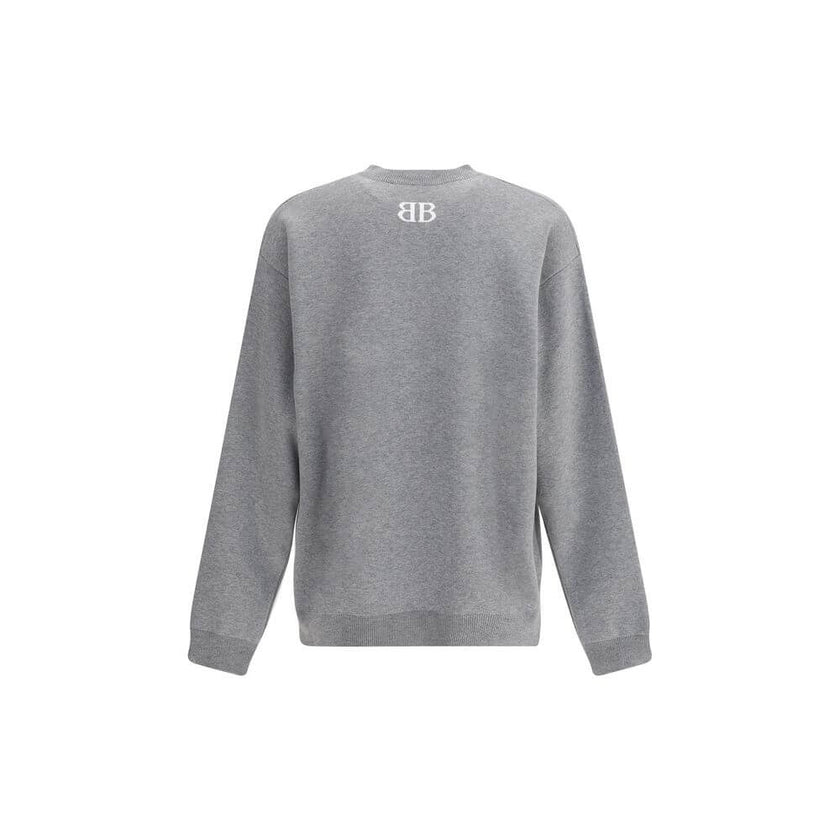 Gray Cotton SweatshirtCotton Sweater by Balenciaga features a ribbed crew neck that ensures comfort and style. The garment features the iconic contrasting monogram on the front, a distinctive element that enhances the design. Ribbed cuffs and hem complete