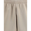 Beige Cotton Bermuda ShortsCotton tracksuit Shorts by Balenciaga feature an elasticized waistband and adjustable inner drawstring for personalized comfort. They feature two American-style side pockets and are embellished with the iconic tone-on-tone embro