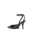 Black Calf Leather Bos Taurus High Heel PumpsVersace’s Medusa Décolleté is an elegant and bold slingback made of patent calfskin with a tapered toe. The sleek stiletto heel enhances femininity, while the iconic La Medusa accessory on the upper adds a dist