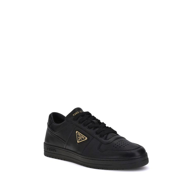 Downtown SneakersPrada’s Downtown leather Sneakers combine sporty lines and iconic details in a refined design. Featuring a paneled construction, they feature a lace-up front closure, perforated round toe and flat sole. The iconic triangular enameled Prad