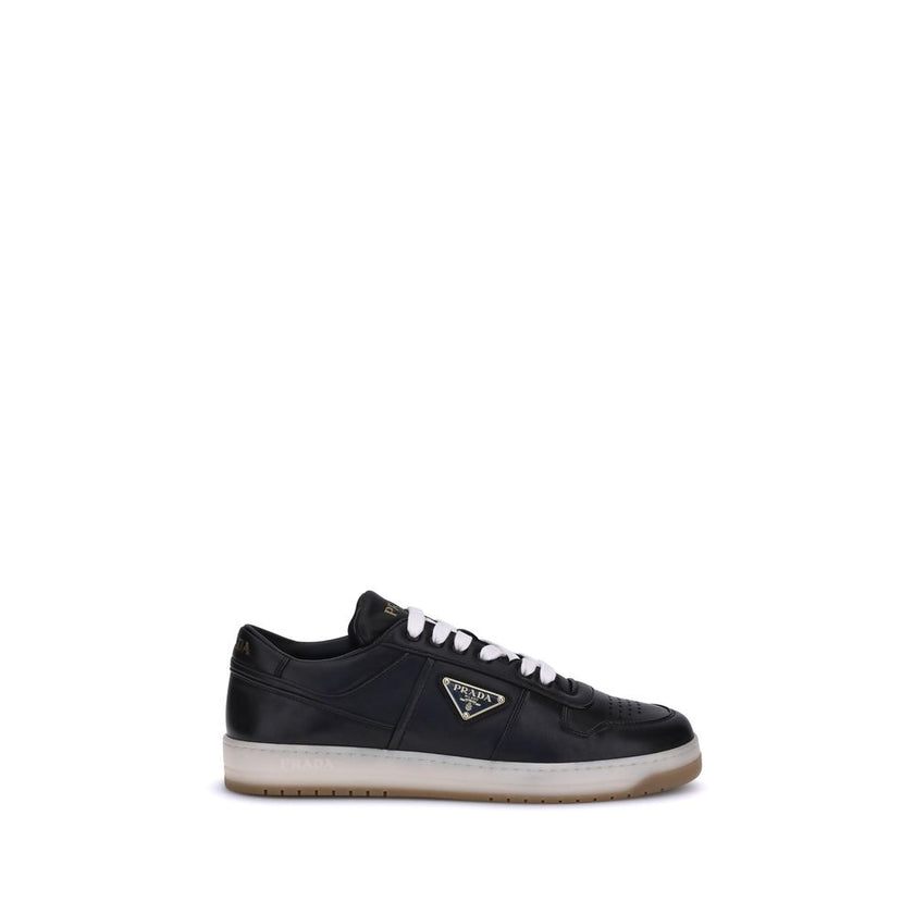 Black Calf Leather Bos Taurus Low Top SneakersPrada’s Downtown leather Sneakers combine sporty lines and iconic details in a refined design. Featuring a paneled construction, they feature a lace-up front closure, perforated round toe and flat sole. The ic