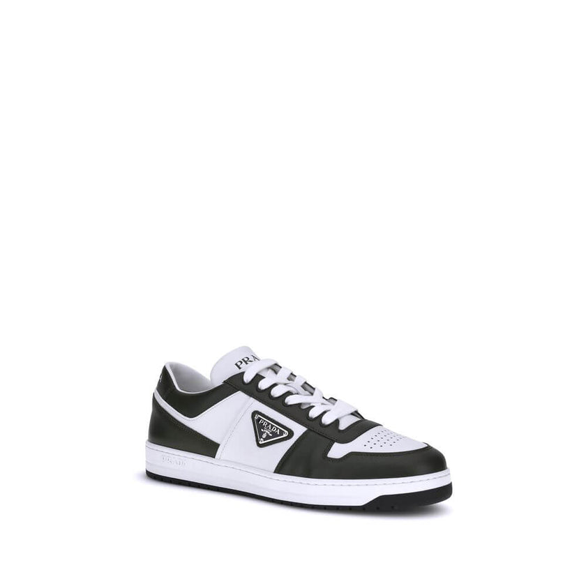 Black Calf Leather Bos Taurus Low Top SneakersStylish and contemporary leather Downtown Sneakers by Prada, these sneakers feature a front lace-up closure and the brand’s signature enameled triangular logo plaque applied to the side panel. The round, perfo